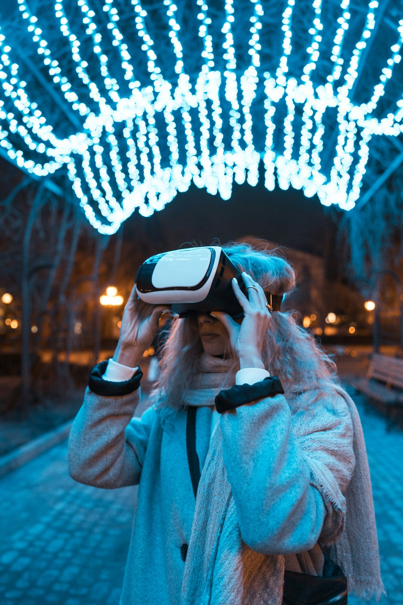 Young girl getting experience VR headset